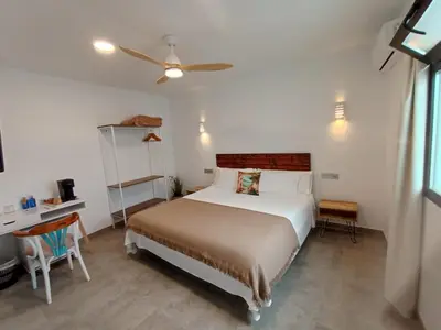 Cama o camas de una habitación en Hostal Aires del Mar