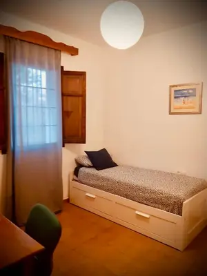 Cama o camas de una habitación en Casa Mirador a la Atalaya