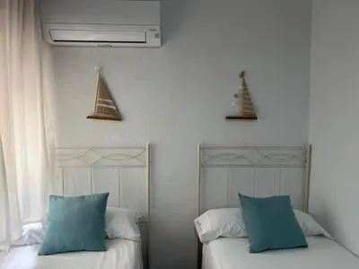 Cama o camas de una habitación en Aquí Ahora San José
