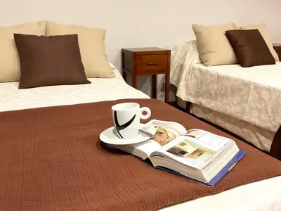 Cama o camas de una habitación en Casa de la Plaza