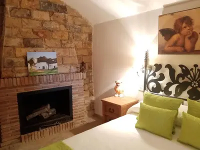 Cama o camas de una habitación en Casa Cueva Soledad