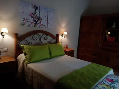 Cama o camas de una habitación en Casa Cueva Soledad