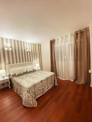 Cama o camas de una habitación en Apartamento LA GRACIA