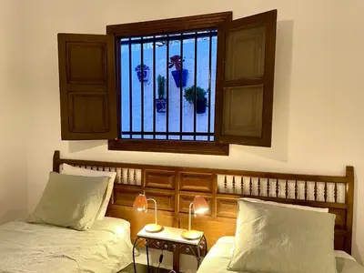 Cama o camas de una habitación en Casa Amigos Sorvilan- La Palmera