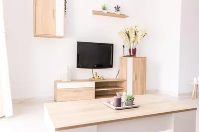 Una televisión o centro de entretenimiento en Villa El Arenal a 3 min de la Playa