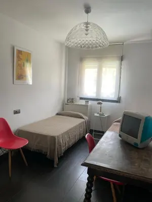 Cama o camas de una habitación en Casa adosada con piscina a 5 minutos de la playa .