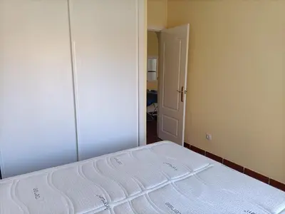 Cama o camas de una habitación en PARQUE VERA Naturista FKK PLAYA, free Wifi