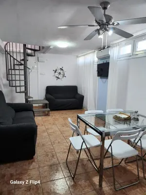 Zona de estar de Apartamento en 1ª linea de playa y Parque Natural Cabo de Gata - planta semisotano