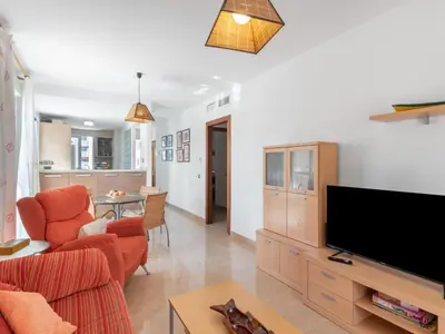 Una televisión o centro de entretenimiento en Apartment Las Mariposas by Interhome