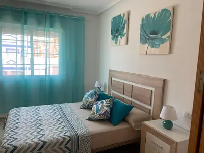 Cama o camas de una habitación en Adosado playa, geoda y Aguilas cerca, con barbacoa y piscina en San Juan de los terreros