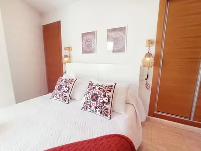 Cama o camas de una habitación en Avenida Principal - Gran Terraza junto a la playa - by Aloha Palma