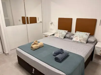 Cama o camas de una habitación en Atico Helena con solarium y jacuzzi privado en Laguna Beach