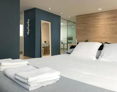 Cama o camas de una habitación en Al_reparo Home Beach _ Adra