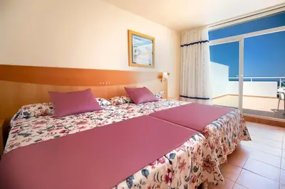 Cama o camas de una habitación en Hotel Servigroup Marina Mar
