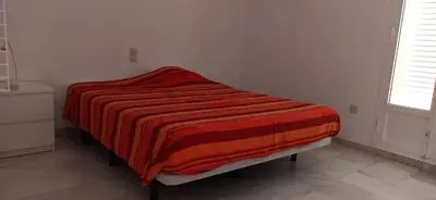 Cama o camas de una habitación en Cortijo13 dúplex de lujo, Puerto Rey