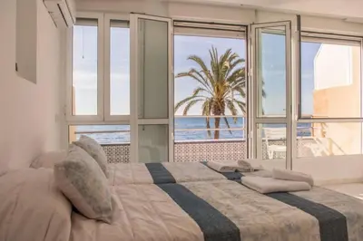 Cama o camas de una habitación en Orilla playa aguadulce