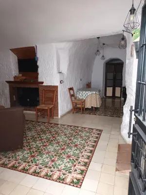 Una televisión o centro de entretenimiento en Cuevas Baza