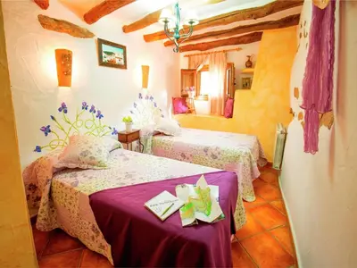 Cama o camas de una habitación en Beautiful holiday home in Laroya with shared pool