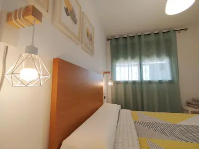 Cama o camas de una habitación en Apartamento Bahía Levante II Águilas