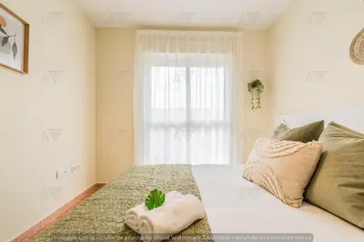 Cama o camas de una habitación en Duplex PARAISO VERA Playa PISCINA PRIVADA