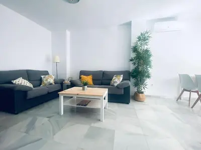 Zona de estar de Apartamento de dos dormitorios en Almería.