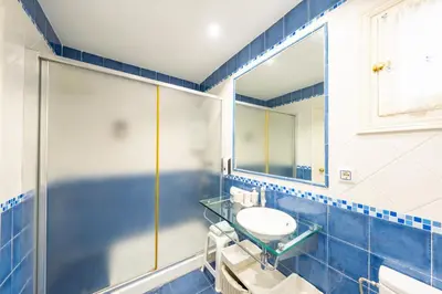 Un baño de Apartamento Panoramico Tres Pinos. Piscina