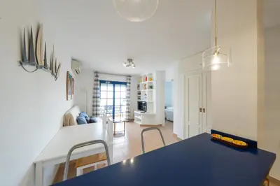 Una cocina o zona de cocina en Apartamento Panoramico Tres Pinos. Piscina