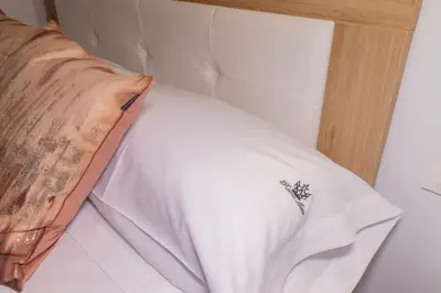 Cama o camas de una habitación en Hotel Reina Aixa