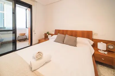 Cama o camas de una habitación en Expoholidays - Plaza Santa Rita