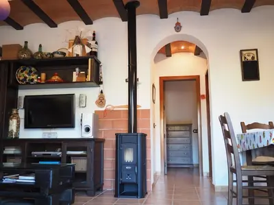 Una televisión o centro de entretenimiento en Casa Juan Gil