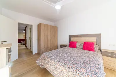 Cama o camas de una habitación en Casa Gómez, parking gratuito en Pleno Centro