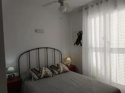 Cama o camas de una habitación en Vera Natura Apartamento Alamar