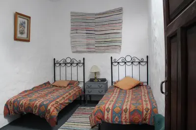 Cama o camas de una habitación en Casa Estrella de las nieves La Alpujarra