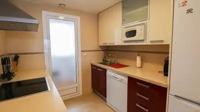 Una cocina o zona de cocina en 2 Room Sleeps 4 Parking 4 Pools Sea 1st Line