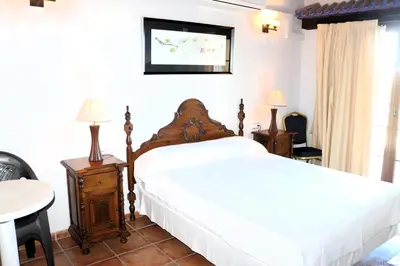 Cama o camas de una habitación en Hostal Rural Turre