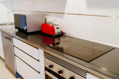 Una cocina o zona de cocina en Tres bel apartamento primera linea de Playa Serena