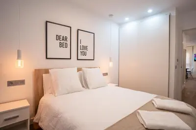 Cama o camas de una habitación en Trendy Homes Puerta Purchena