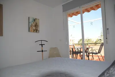Cama o camas de una habitación en Vera Playa Naturista, Mar y Sol