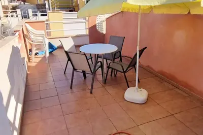 Un balcón o terraza de Atico con Jacuzzi Las Marinas Vera