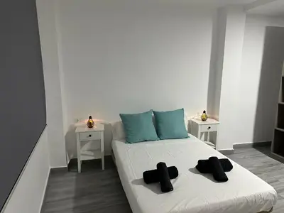 Cama o camas de una habitación en Estadio playa