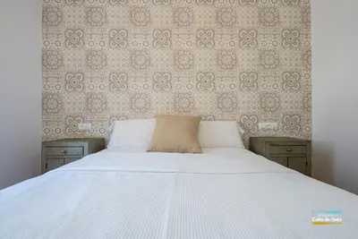 Cama o camas de una habitación en Apartamento Peñón Blanco