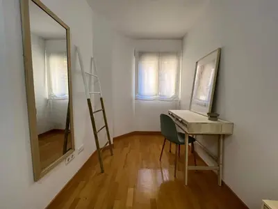 Una televisión o centro de entretenimiento en Apartamento Playa Delicias