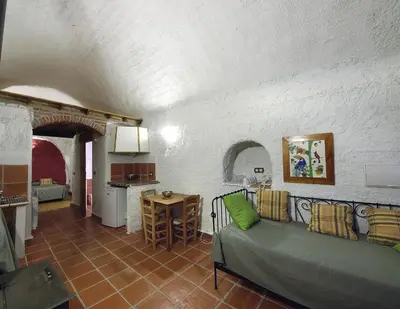 Zona de estar de Casas Cueva y Cortijo La Tala en Guadix