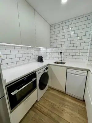 Una cocina o zona de cocina en Apartamentos Playa Ventilla