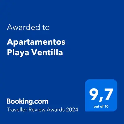 Certificado, premio, señal o documento que está expuesto en Apartamentos Playa Ventilla