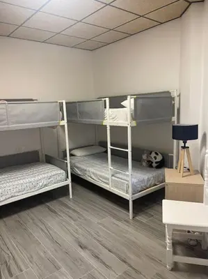 Cama o camas de una habitación en Casita coqueta en Agua Amarga