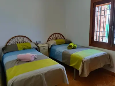 Cama o camas de una habitación en Rentaly Holidays Playa Villaricos