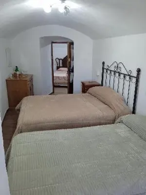 Cama o camas de una habitación en la cueva de guadix