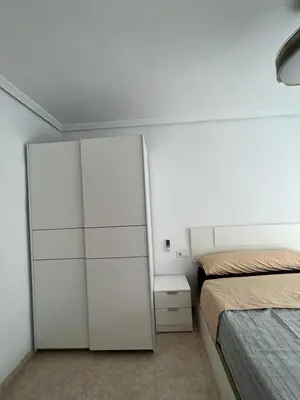 Cama o camas de una habitación en Ático duplex con Vista Mar y Terraza Privada a 200m de la playa hasta 6 personas