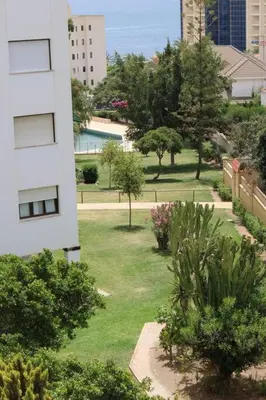 Jardín al aire libre en apartamento vista al mar piscina playa 3 min